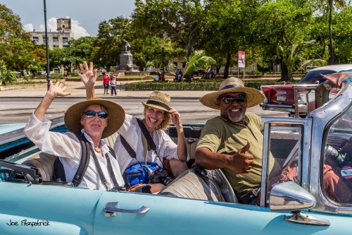tourists in convertable